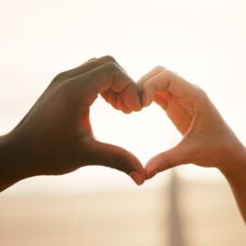 heart couple image of two hands in the shape of a heart